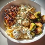 hot honey balsamic chicken alfredo with whipped feta crispy brussels chips