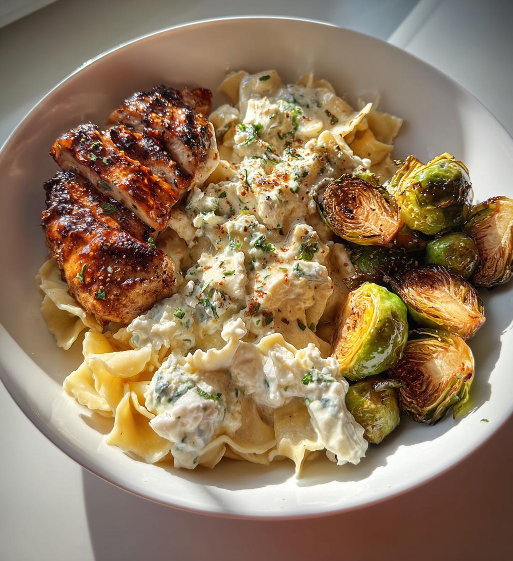 hot honey balsamic chicken alfredo with whipped feta crispy brussels chips