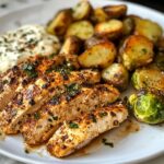 smoked paprika chicken alfredo with feta tahini cream crispy brussels potato combo wedges